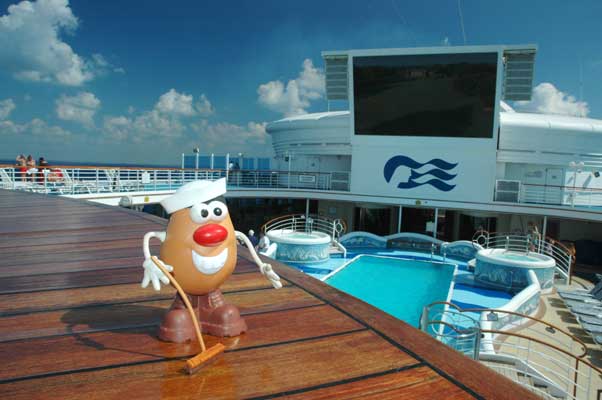Spud swabs the deck of the Mighty Grand Princess