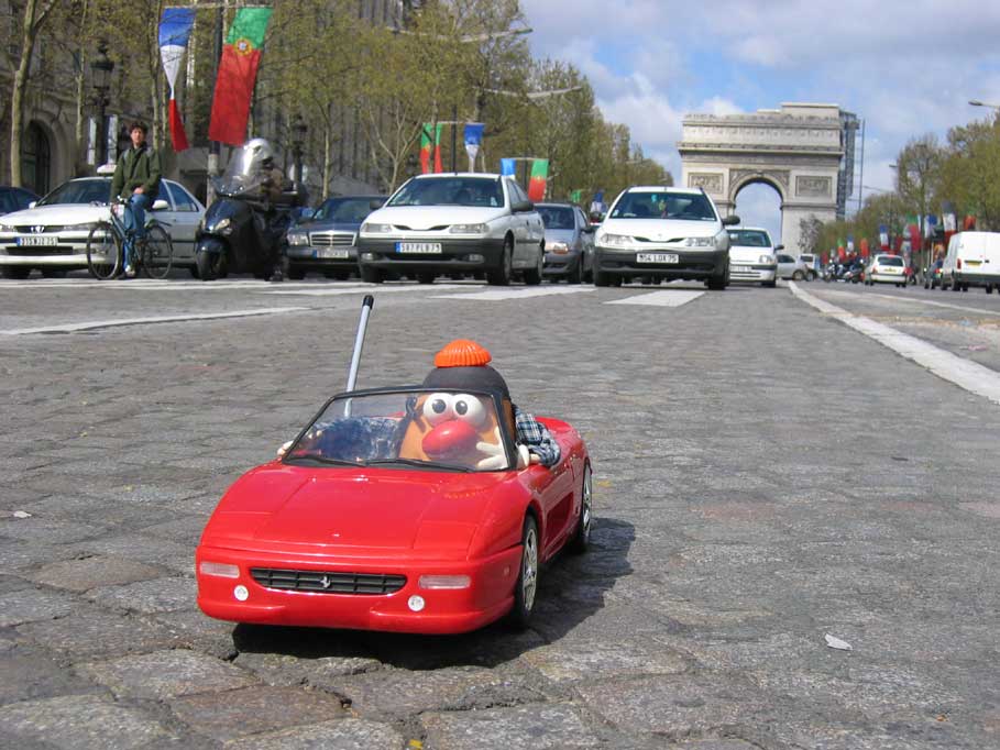 Spud cruises down the Champs-Elysées