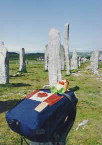 Exhausted from hauling his oversize backpack, Spud collapses after finally reaching the Callanish Stones on the Isle of Lewis