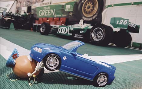 Spud makes tweaks his engine just prior to the start of the race