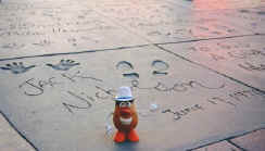 People obviously can't read the WET CEMENT signs at Gruman's Chinese Theater