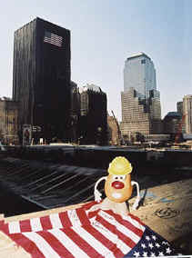Spud pays his condolences in the hard hat area of Ground Zero. These buildings were once completely obscured by the Twin Towers 