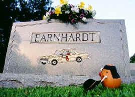 Spud pays homage to Dale Earnhardt at the site of his father's grave