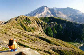 Spud looks on to the percolating Mount St. Helens as she rebuilds her volcanic cone