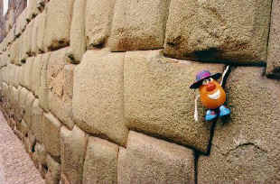 Spud proves the Incas wrong by jamming his hand between the intricately carved stones that form the amazing walls throughout Cusco