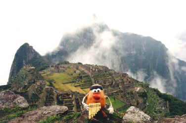 Spud plays the ancient Incan tribal song 'Smoke on the Water' on a traditional pan flute high in the Andes overlooking the lost city